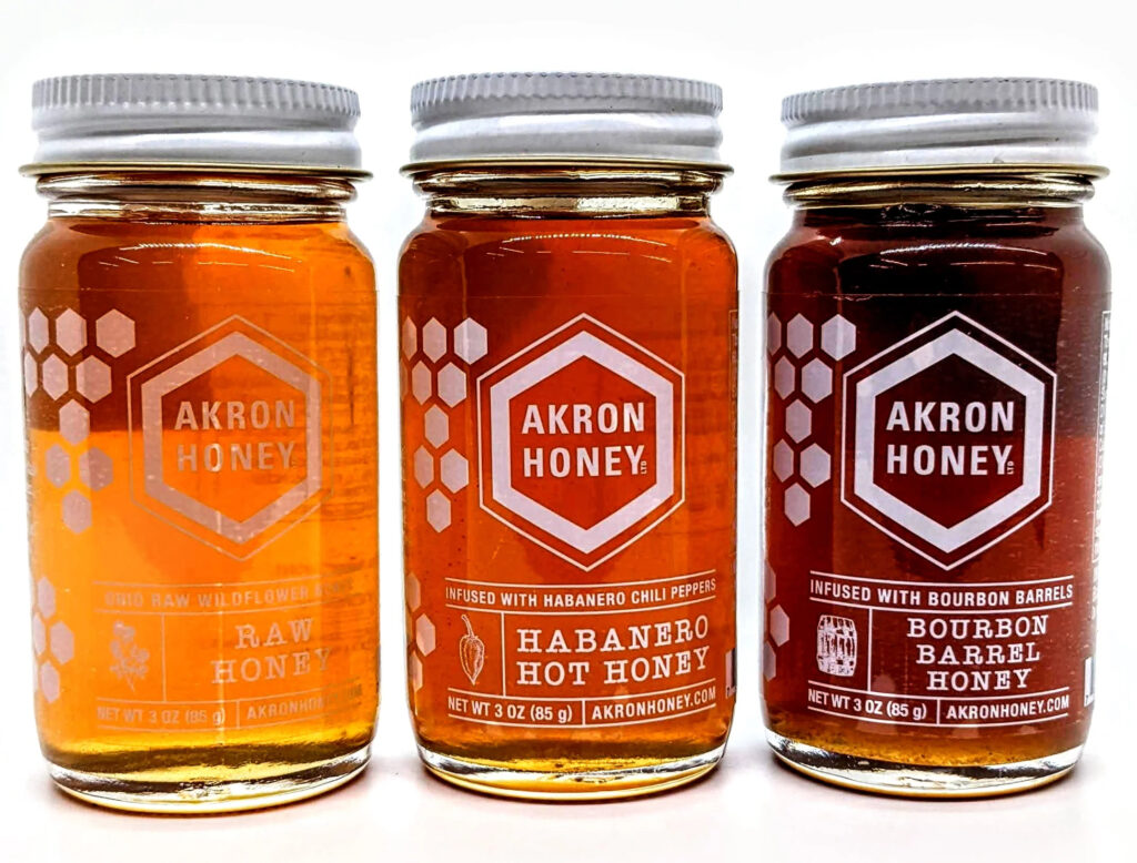 Three flavored jars of Akron Honey