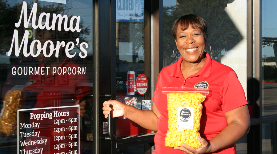 Debra Moore of Mama Moore's Gourmet Popcorn outside of her store