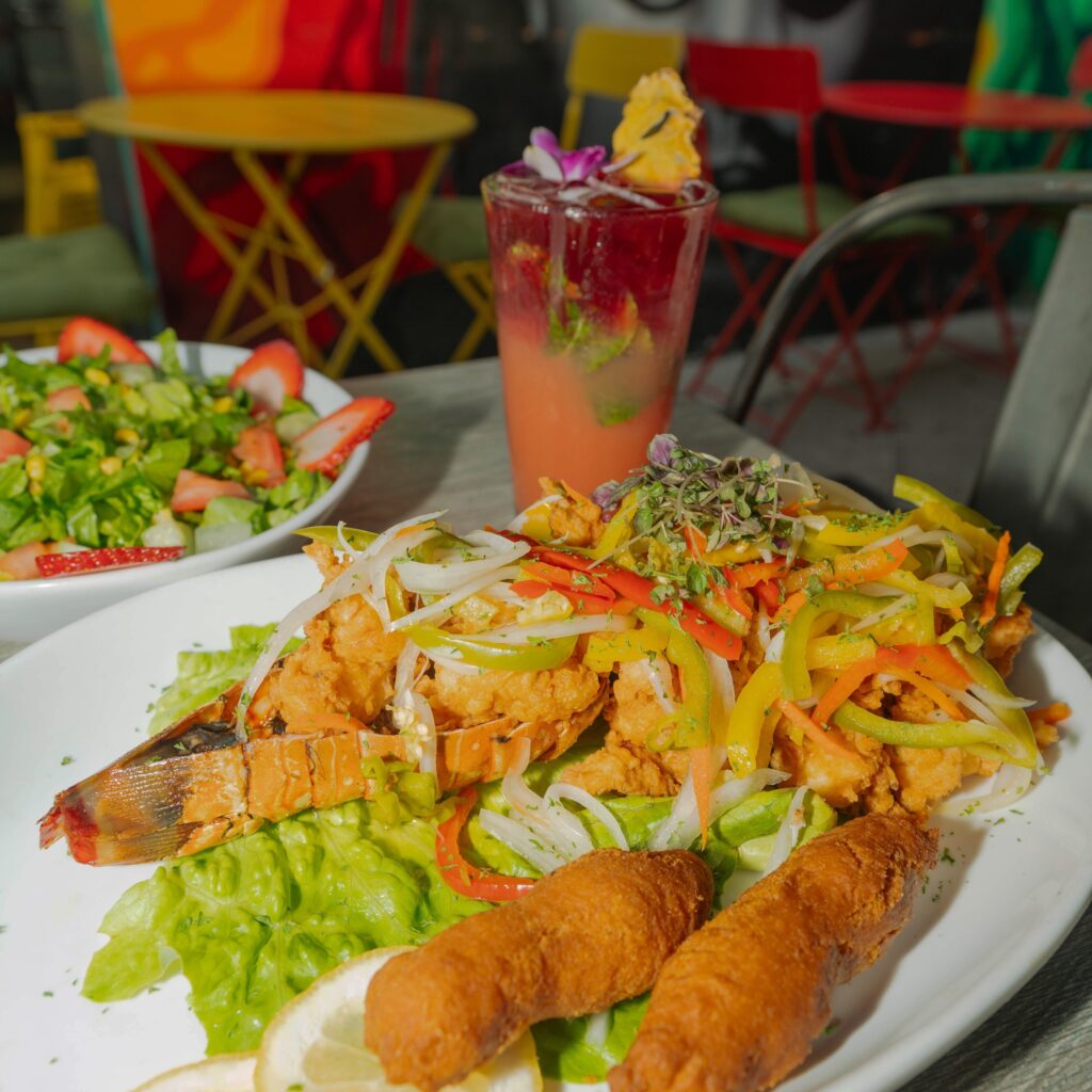 Fried Escovitch Lobster Tail w/ a DJK Chopped Salad from Dukunoo Jamaican in Miami