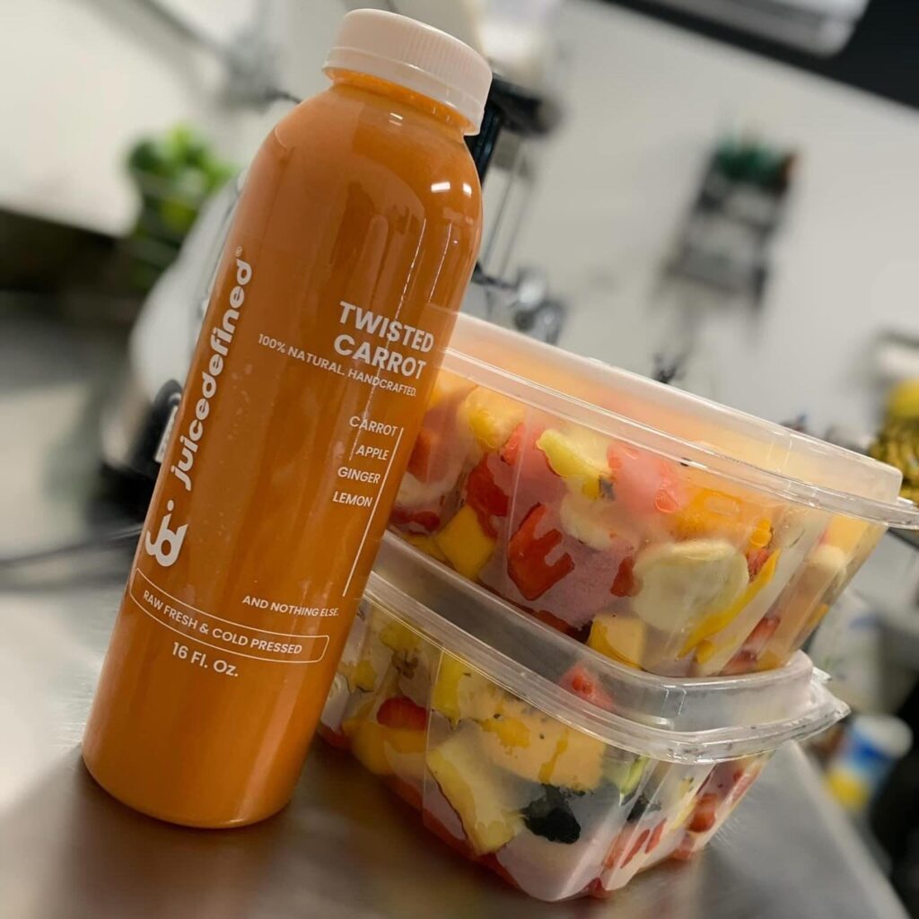 Fresh fruit and pressed carrot juice from Juice Defined